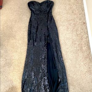Black strapless hoco dress. Worn once. Great condition.